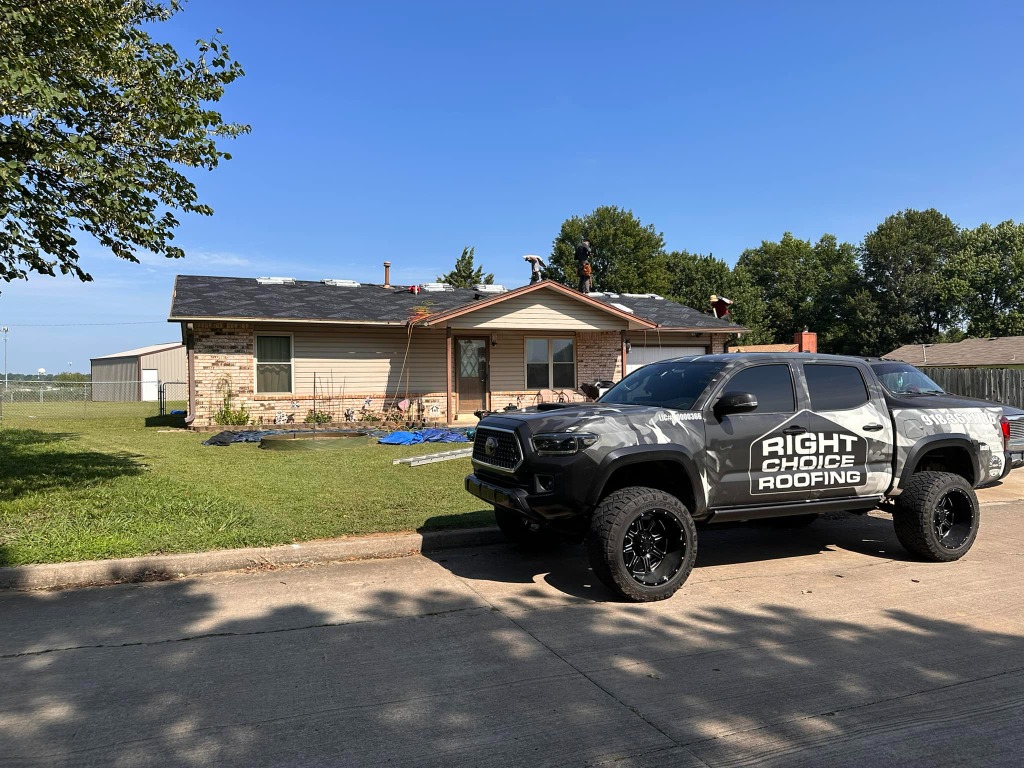 Right Choice Roofing wrapped truck at residential job site