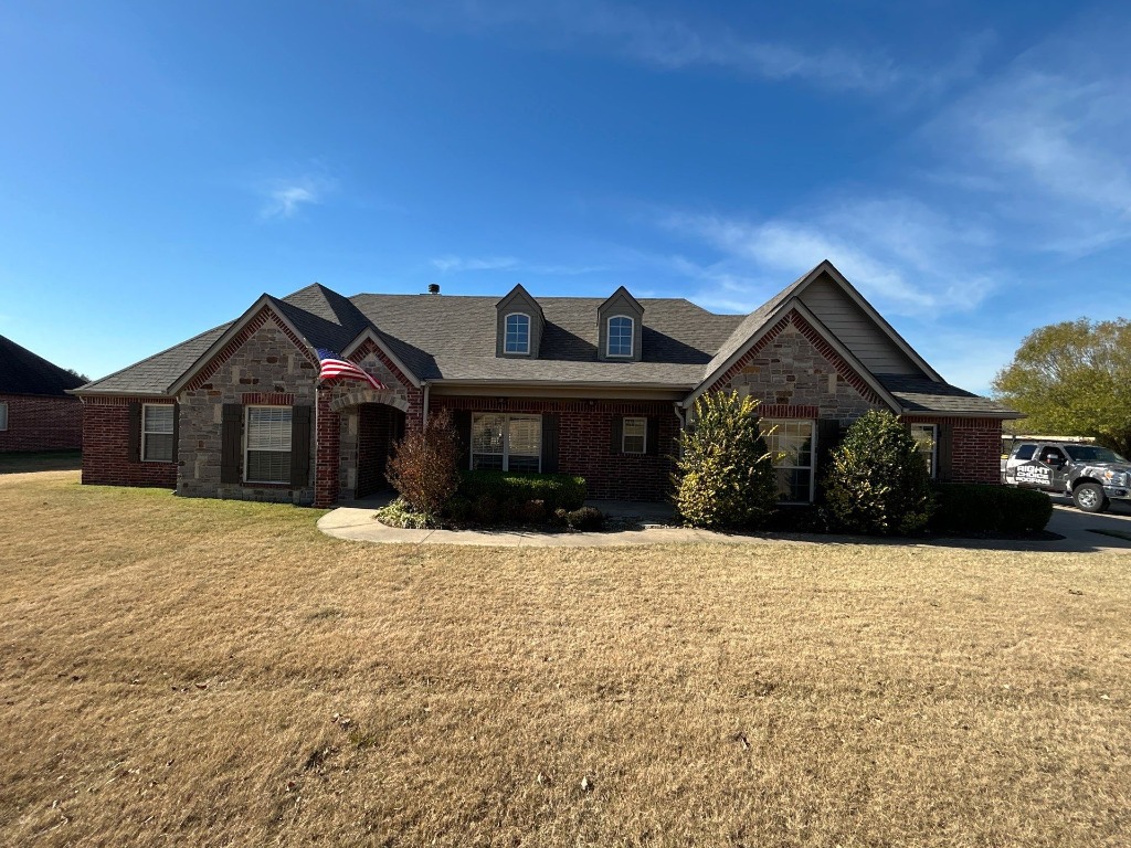Front exterior view of a new Malarkey roof installation